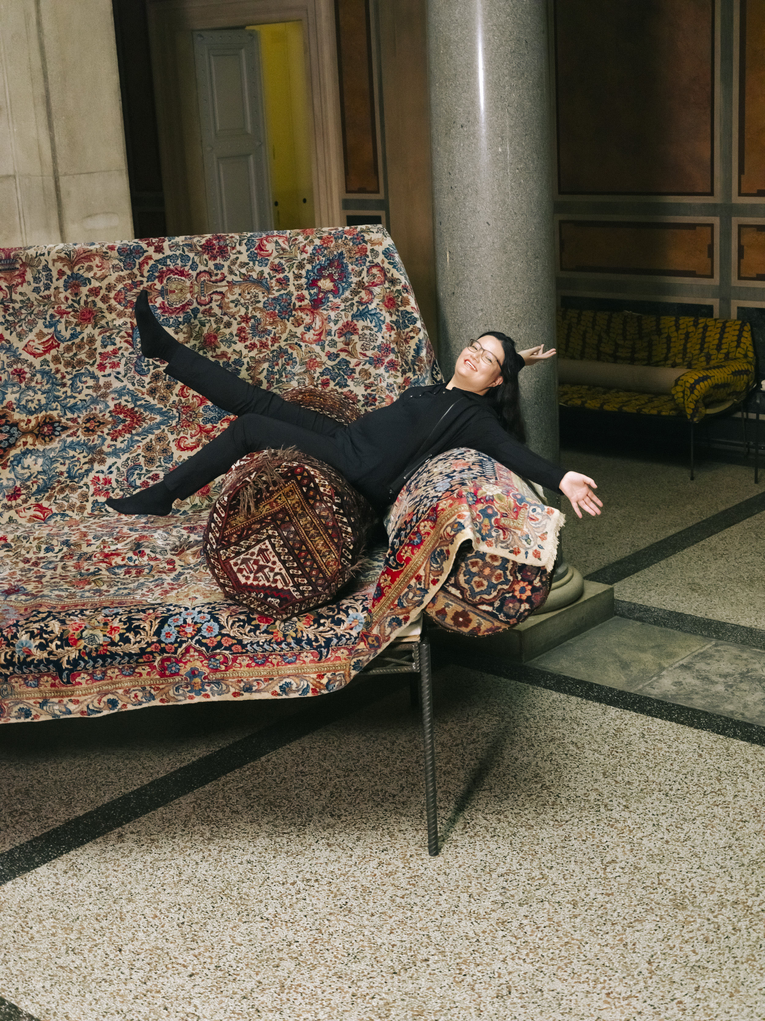 MAK – Museum of Applied Arts, Vienna employee Zuzanna Dimagiba on a sofa designed by the Austrian artist group “Gelatin”
