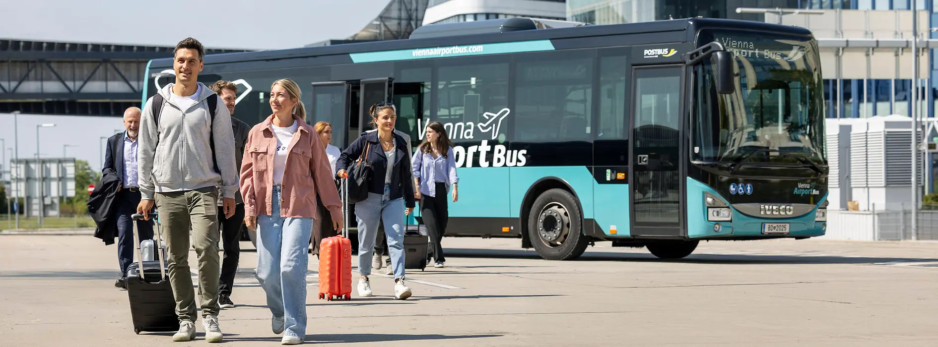 Passengers disembarking from the Vienna Airport Bus