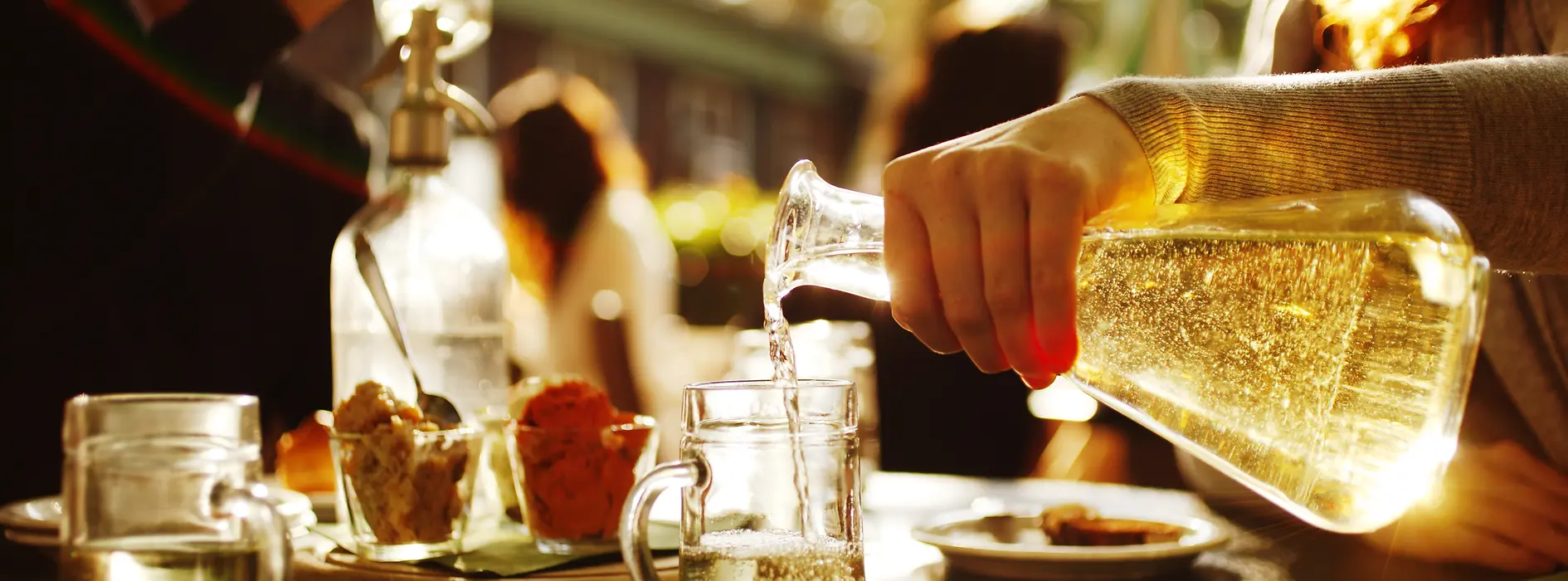 Pouring wine at the heuriger