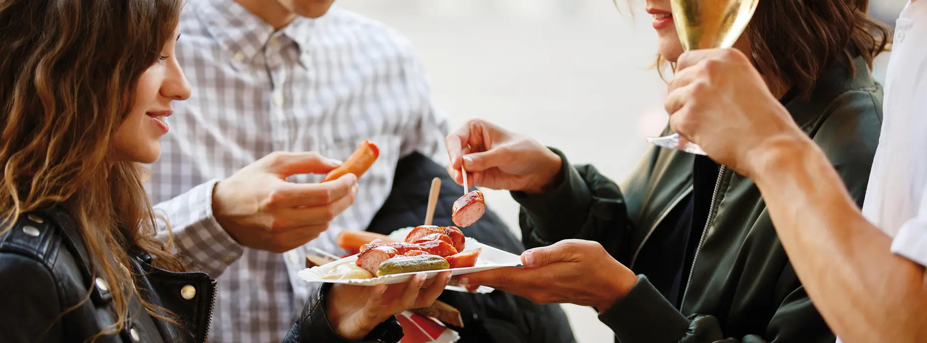 People at a sausage stand