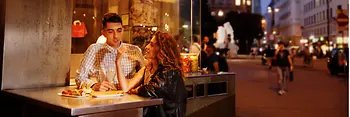People at a sausage stand 