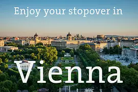 Vista de Viena con la inscripción «Disfrute de su escala en Viena».