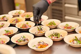 Arrange dishes on several plates