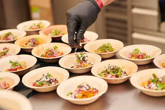 Arrange dishes on several plates
