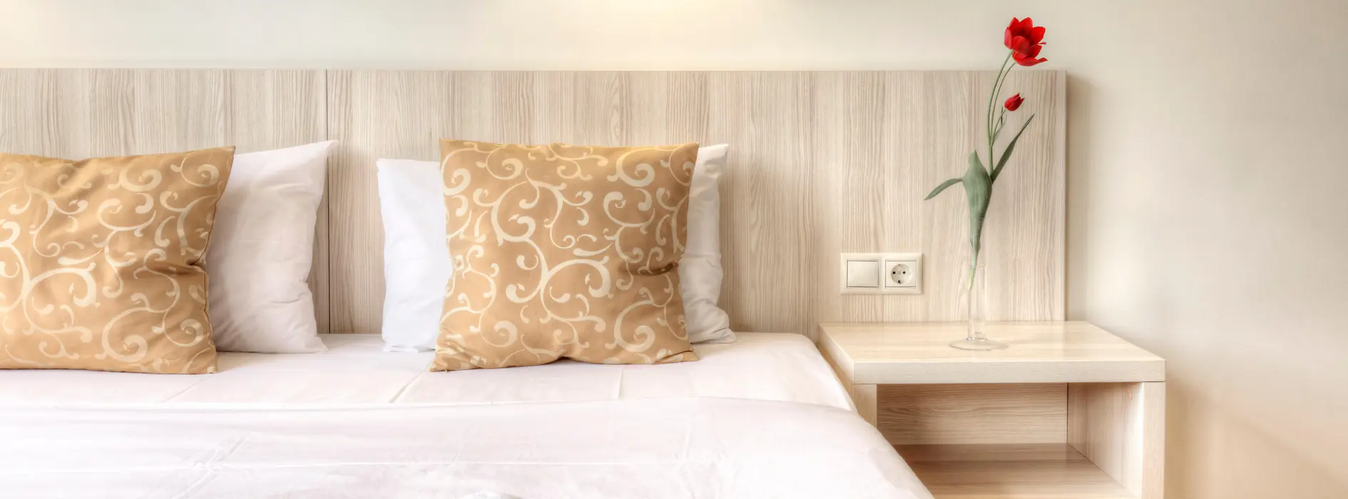 Bed in a hotel room