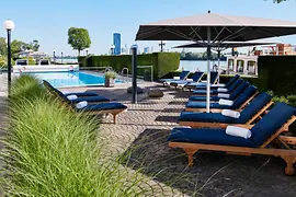 Outdoor pool with loungers