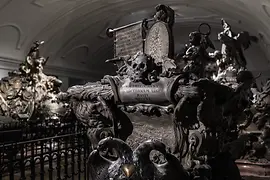 Casket with skull sculpture and figures