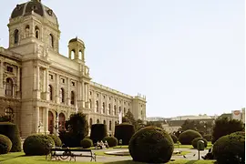 Couple lying on the meadow in front of the Museum of Fine Arts