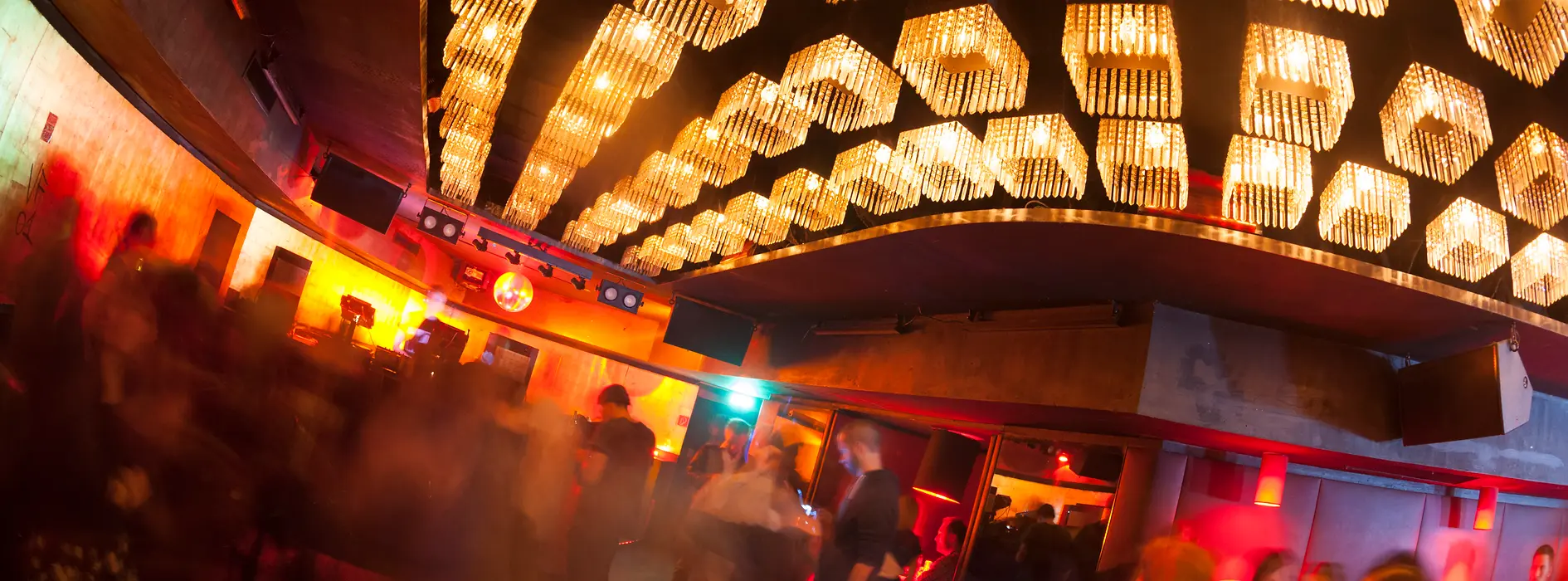 Sass, interior shot with a view toward the dance floor and guests 