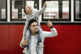 "Remise" Transport Museum, a father carries his son on his shoulders
