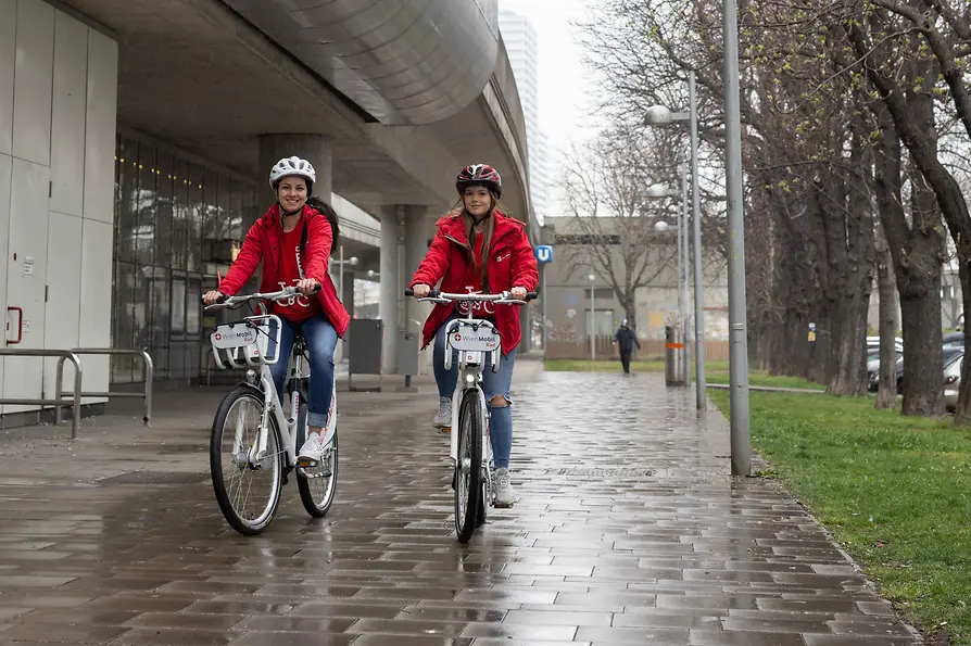 Two women on bicycles
