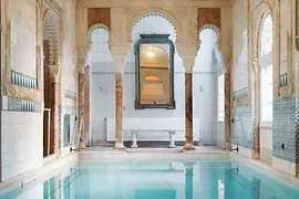 Historic pool with columns in the gay sauna Kaiserbründl