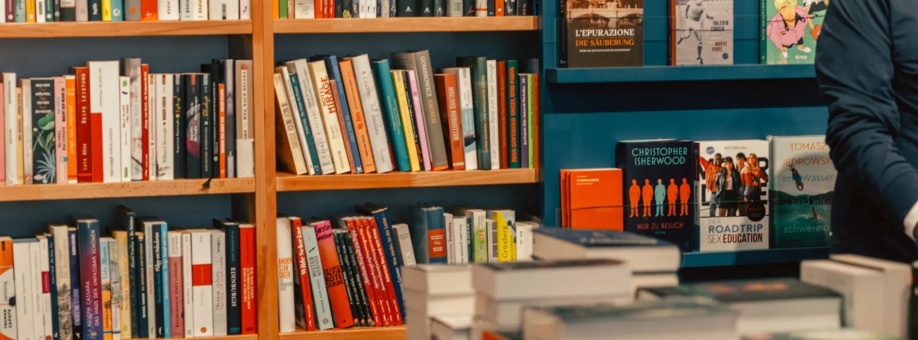 Shelves and tables with books in the LGBT bookstore Löwenherz