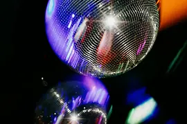 Glitterballs in the gay club Why Not