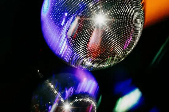 Glitterballs in the gay club Why Not
