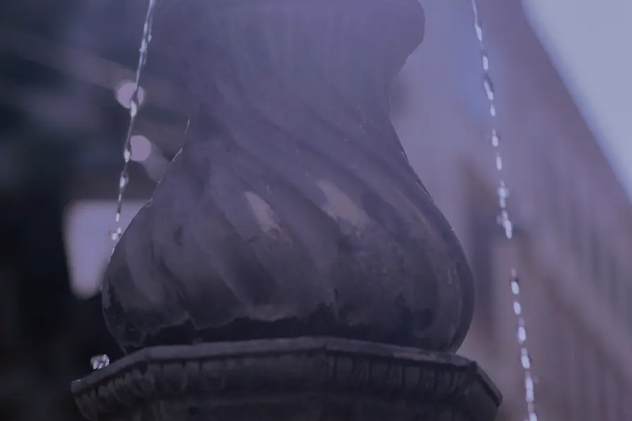 Detail of a historic drinking fountain in Vienna
