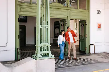 A couple leaving the subway station