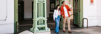 A couple leaving the subway station