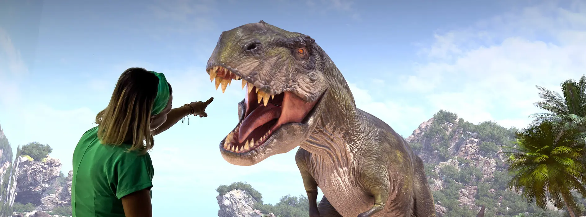 Woman and child in front of a virtual dinosaur
