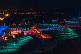 Vienna Philharmonic’s 2024 Summer Night Concert at Schönbrunn, with illuminated audience and gardens at night